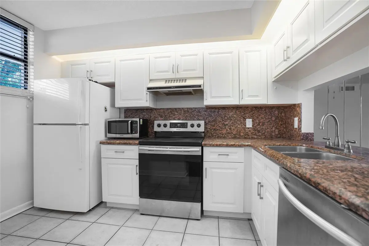 Photo 5 at 109 Lake Emerald Drive 110, Oakland Park