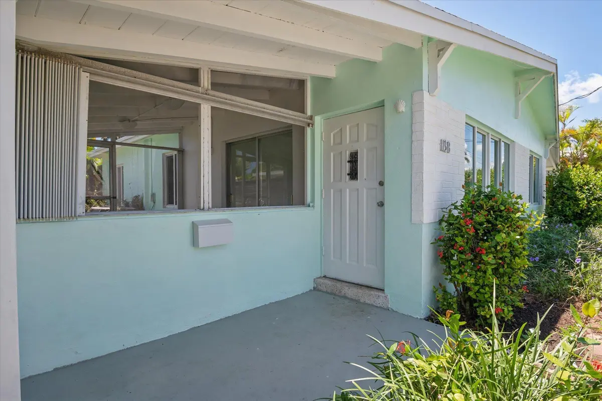 Front door entryway and screened patio o at 1158 Grant Street, Hollywood