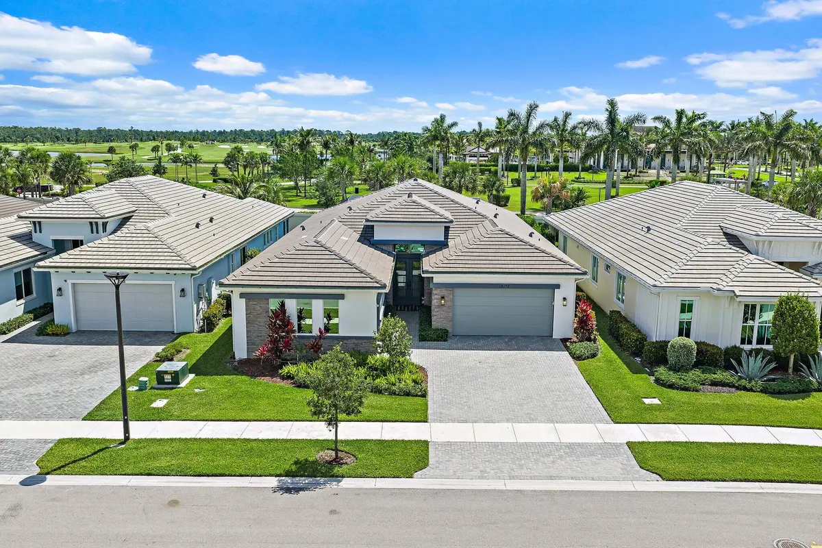 Front Exterior facing West at 12172 Waterstone Circle, Palm Beach Gardens
