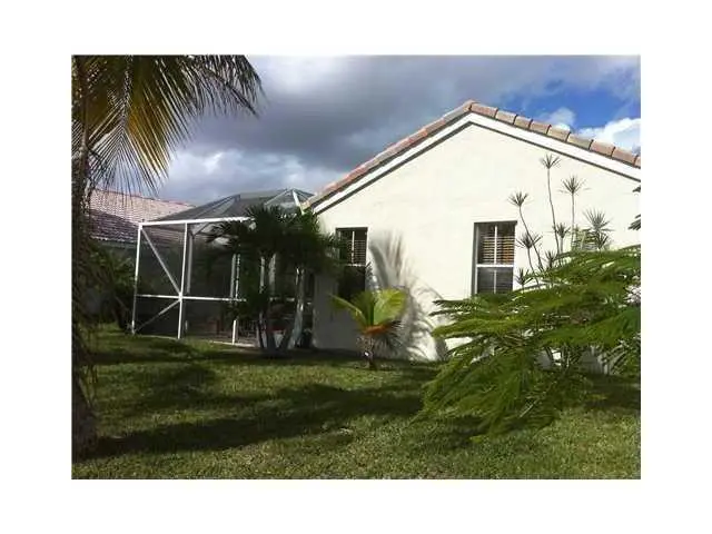 Exterior Front at 824 Savannah Falls Drive, Weston