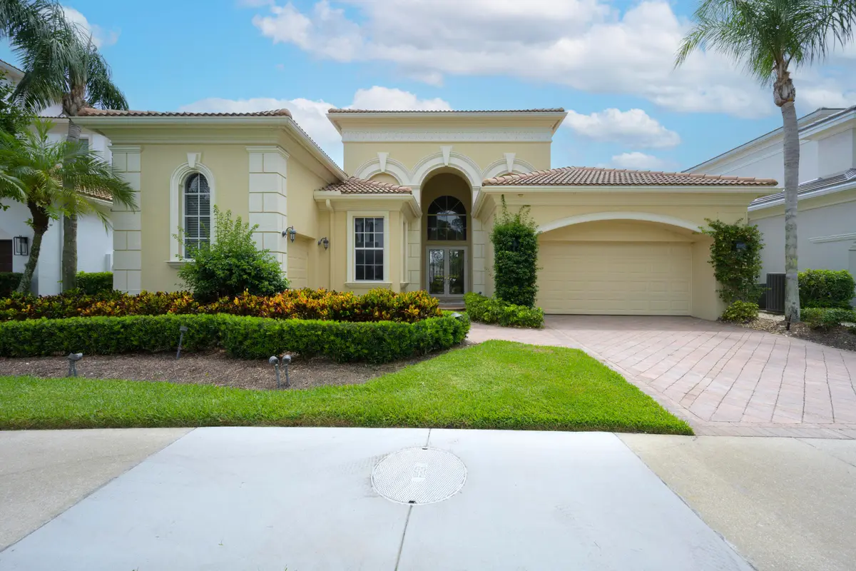 Front Elevation at 118 MONTE CARLO Drive, Palm Beach Gardens