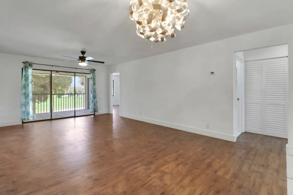 Dining Area_Living Area at 6940 SE Constitution Boulevard 3-203, Hobe Sound