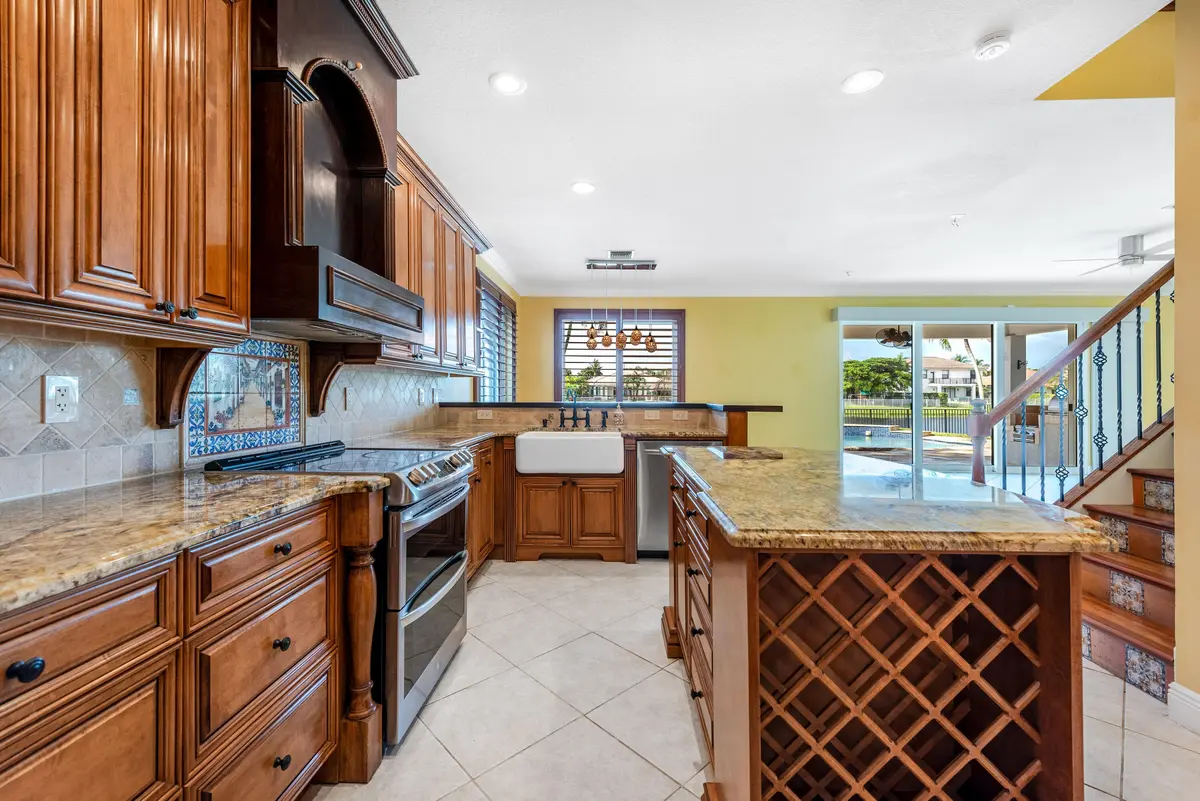 Kitchen with Island at 112 ISOLA Circle, Royal Palm Beach