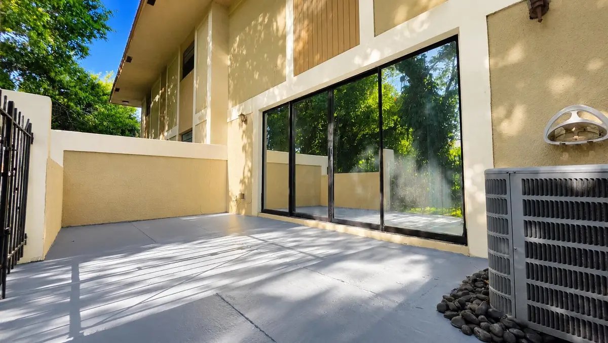 Beautiful Patio with Sliding Glass Doors at 8801 W Sample Road 4, Coral Springs
