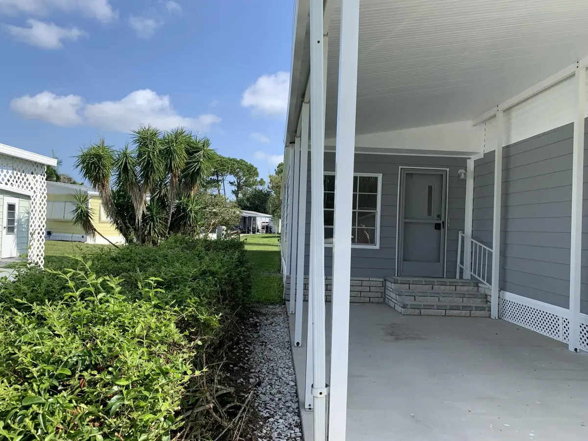 Carport and Left Side at 34 San Luis Obispo, Fort Pierce