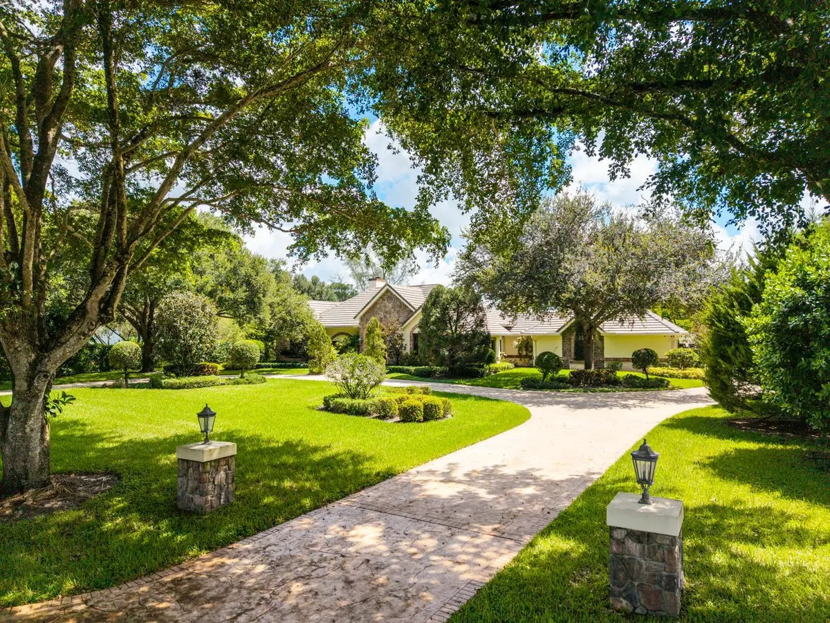 004-039-Front Yard-1334x1000 at 5591 W Leitner Drive, Coral Springs