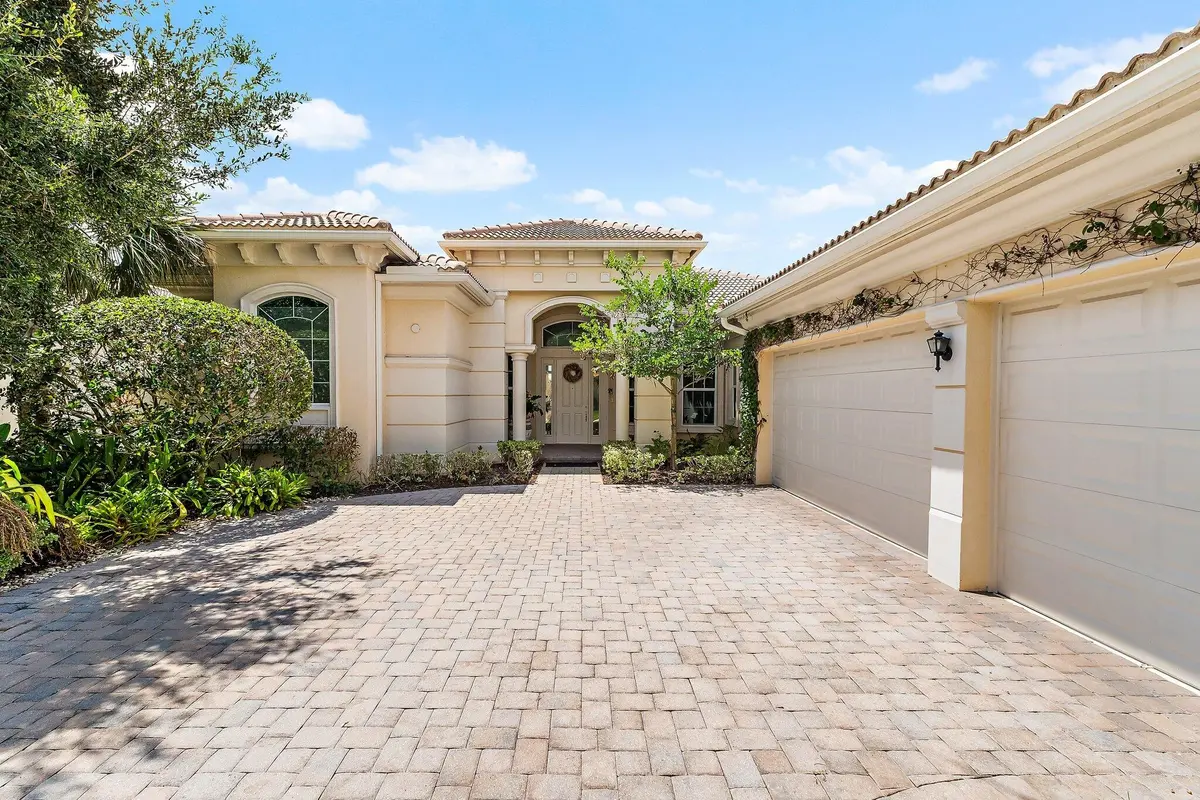 Front Exterior at 114 Carmela Court, Jupiter