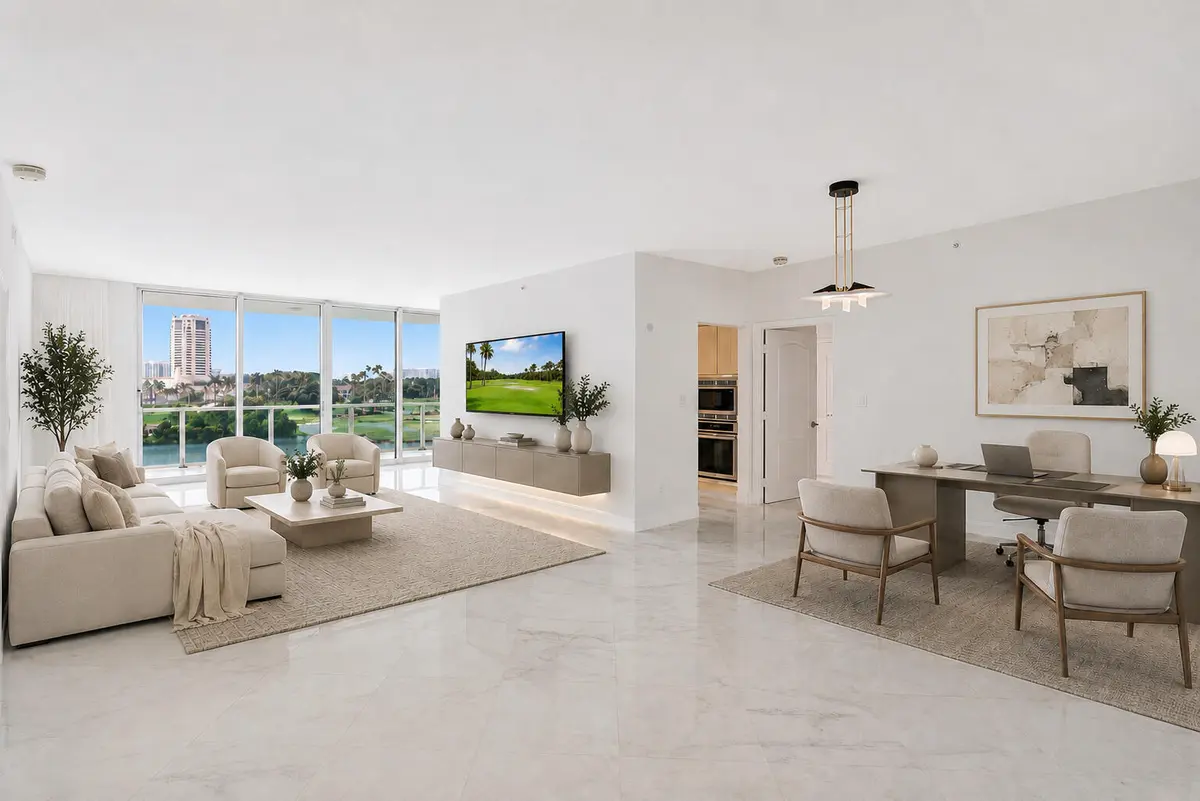 living_room_home_office_golf_course_tv_c at 500 SE Mizner Boulevard A404, Boca Raton