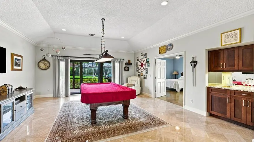 To Den & Bar at 1 WYCLIFF Road, Palm Beach Gardens