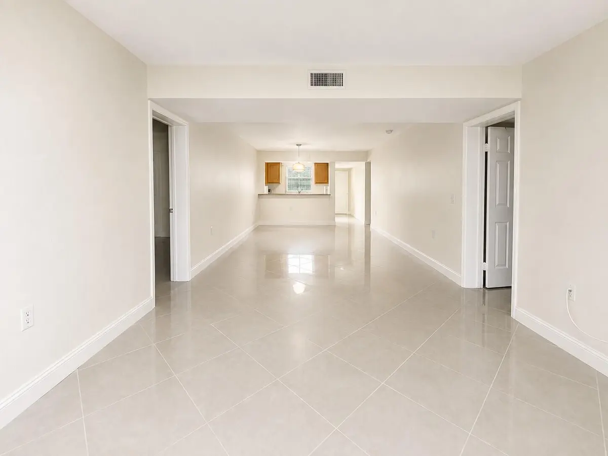 Living and dining at 3516 Whitehall Drive 105, West Palm Beach