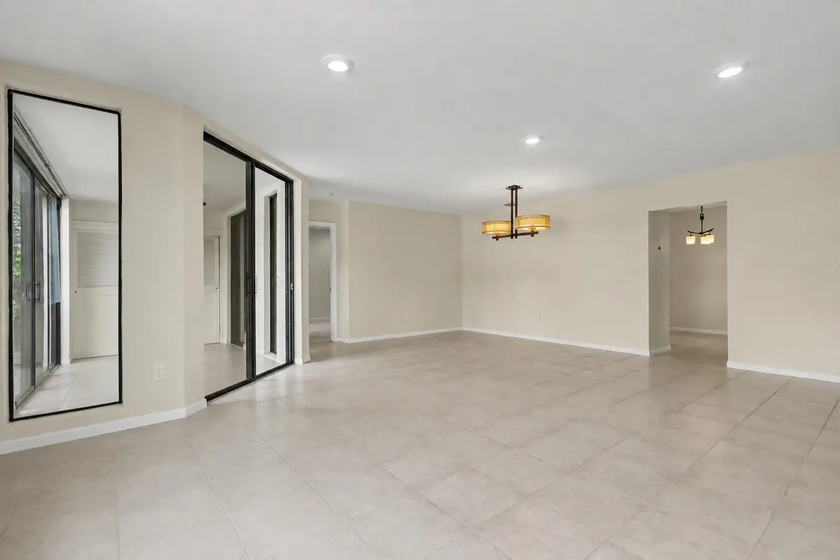 living room without chair angle 2 at 5136 FLORIA Drive H, Boynton Beach