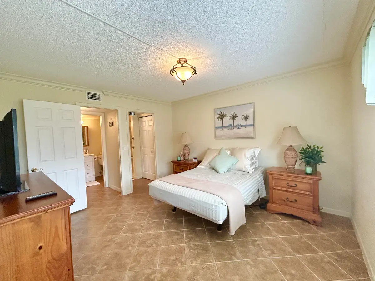 MASTER BEDROOM at 131 LAKE PINE Circle D-1, Greenacres
