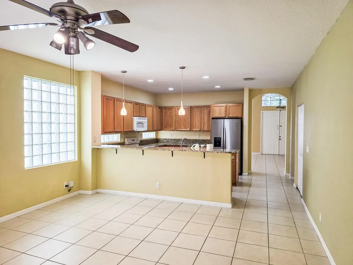 4 - family rm & kitchen at 873 Gazetta Way, West Palm Beach