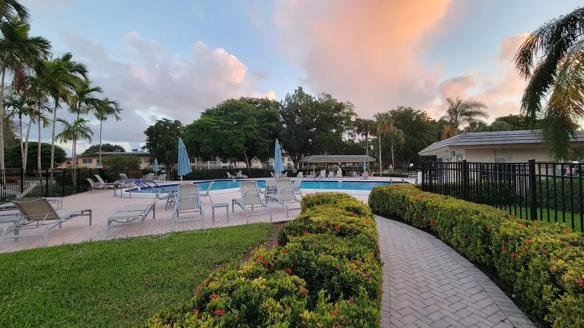 Pool area at 4401 MARTINIQUE Court D4, Coconut Creek
