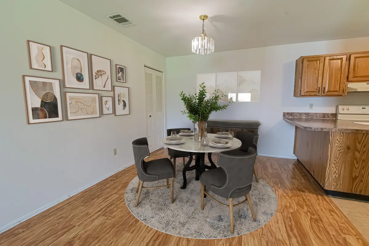 virtually staged - dining at 1566 SE Dewberry Court, Port St. Lucie