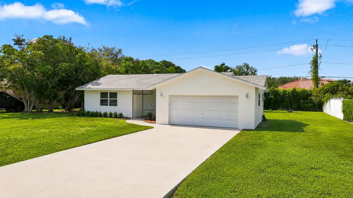 Front Exterior & Driveway at 5114 Conklin Drive, Delray Beach