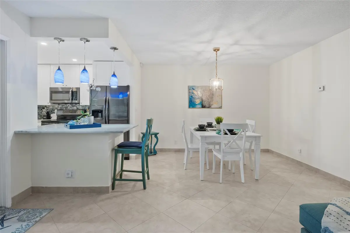 dining room & kitchen at 1340 NE 28TH Avenue 242, Pompano Beach