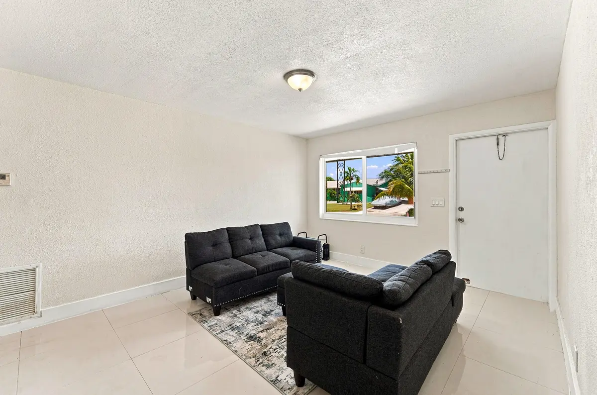 02_living room at 1010 Pinetree Drive, Lantana
