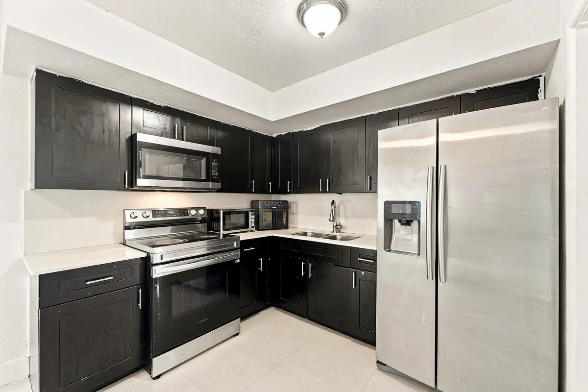 04_kitchen at 1010 Pinetree Drive, Lantana