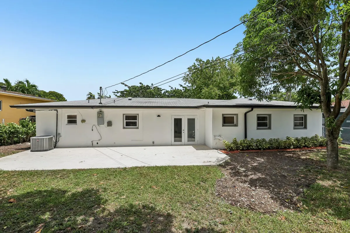 Back of Home at 1040 NW 149TH Street, Miami