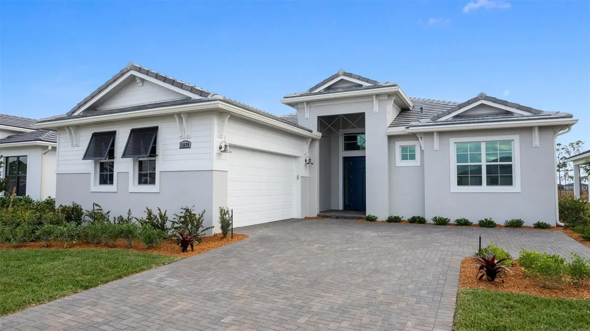 Front Exterior at 13670 SE Grovewood Drive, Port St. Lucie