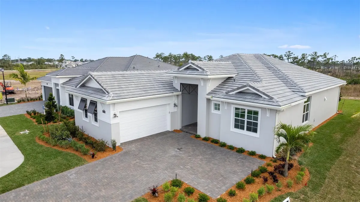 Front Exterior at 13670 SE Grovewood Drive, Port St. Lucie