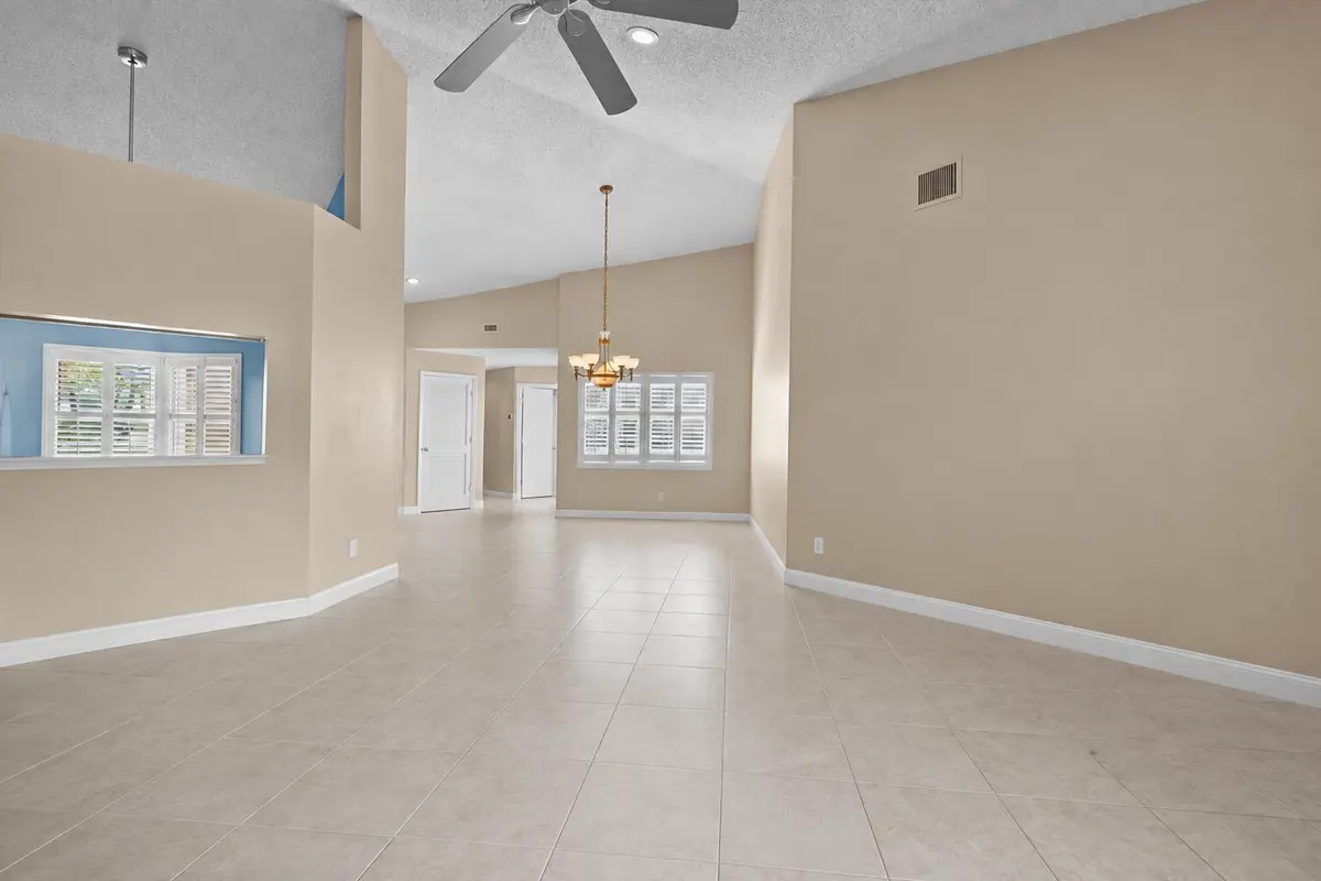 living to dining at 2424 SW Foxpoint Trail, Palm City