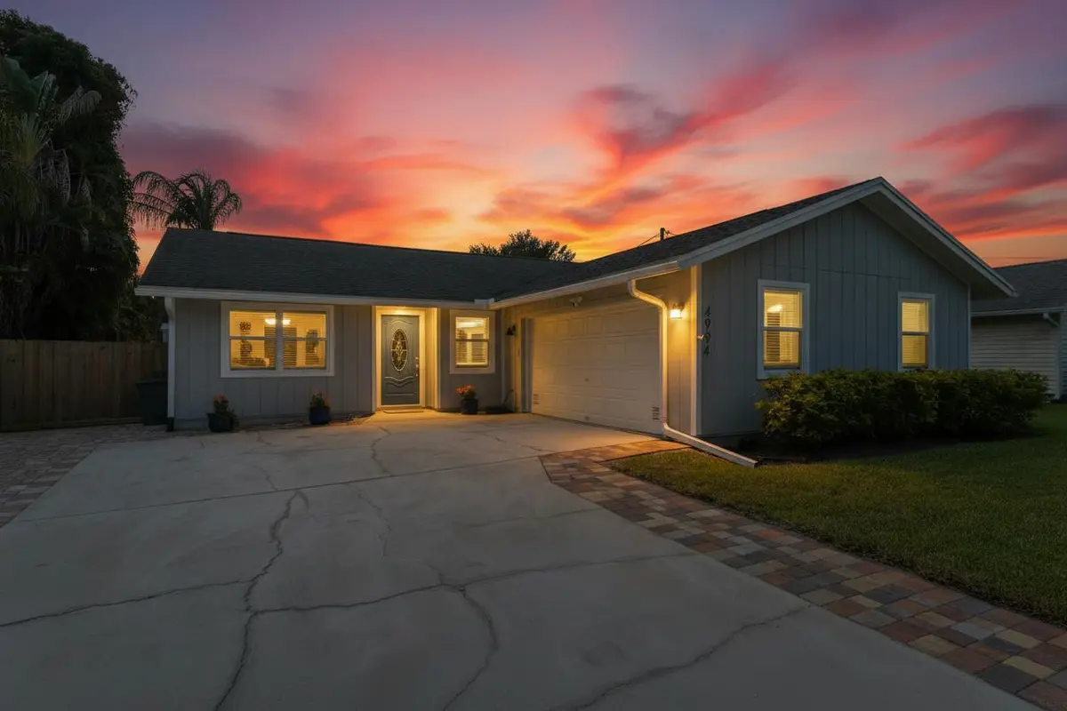 Front twilight at 4994 SE PINE KNOLL Way, Stuart