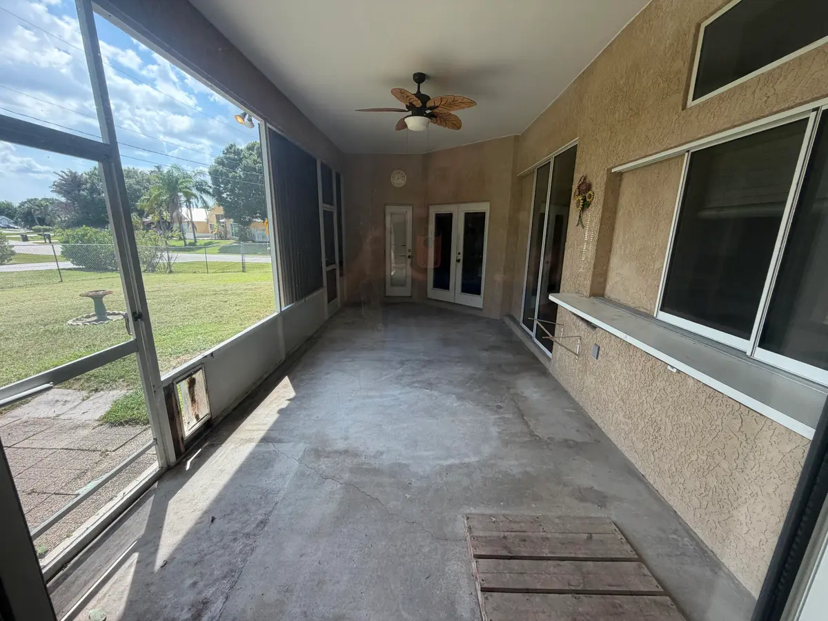 REAR PATIO at 606 SE STOW Terrace, Port St. Lucie