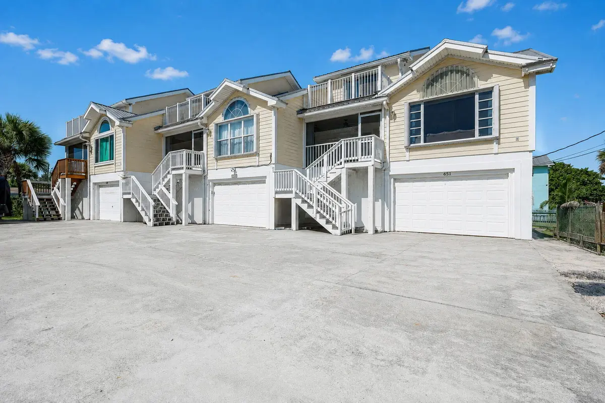 EXTERIOR FRONT OF TOWNHOMES at 651 HERNANDO Street, Fort Pierce