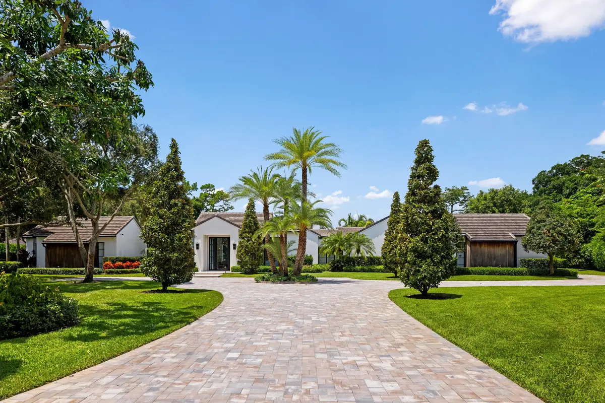 Front Exterior at 9 Country Road, Village of Golf