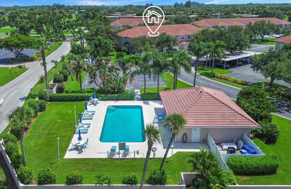 Community Pool Aerial at 295 Grand Royale Circle 202, Vero Beach