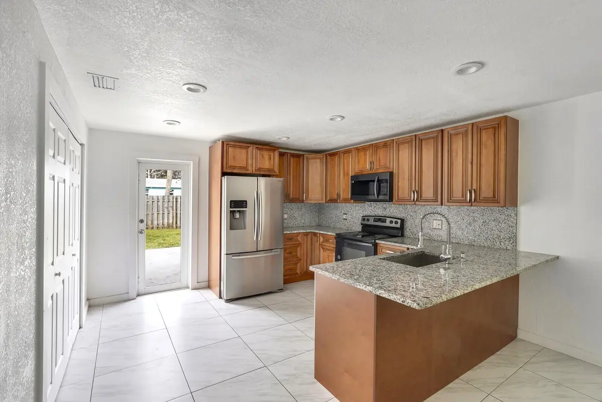 Granite Counter Tops at 4389 BELLEWOOD Street, Palm Beach Gardens