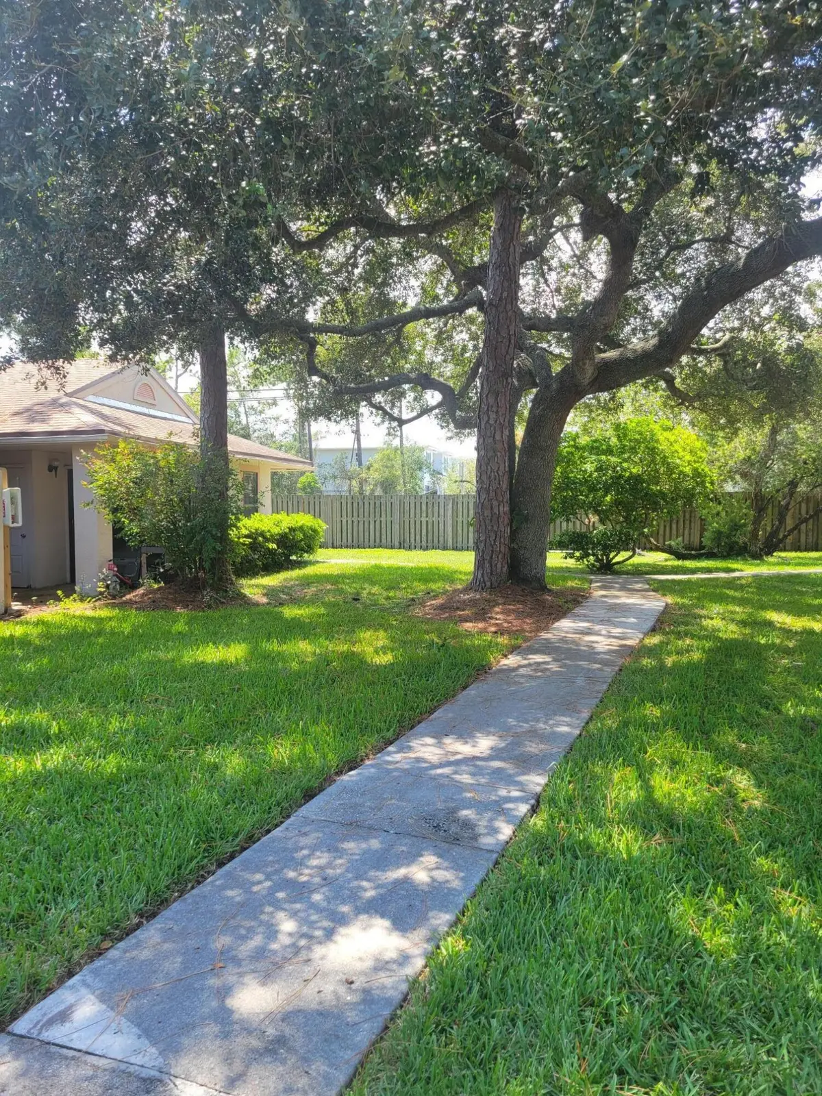 The walkway to Unit D at 2837 STONEWAY Lane D, Fort Pierce
