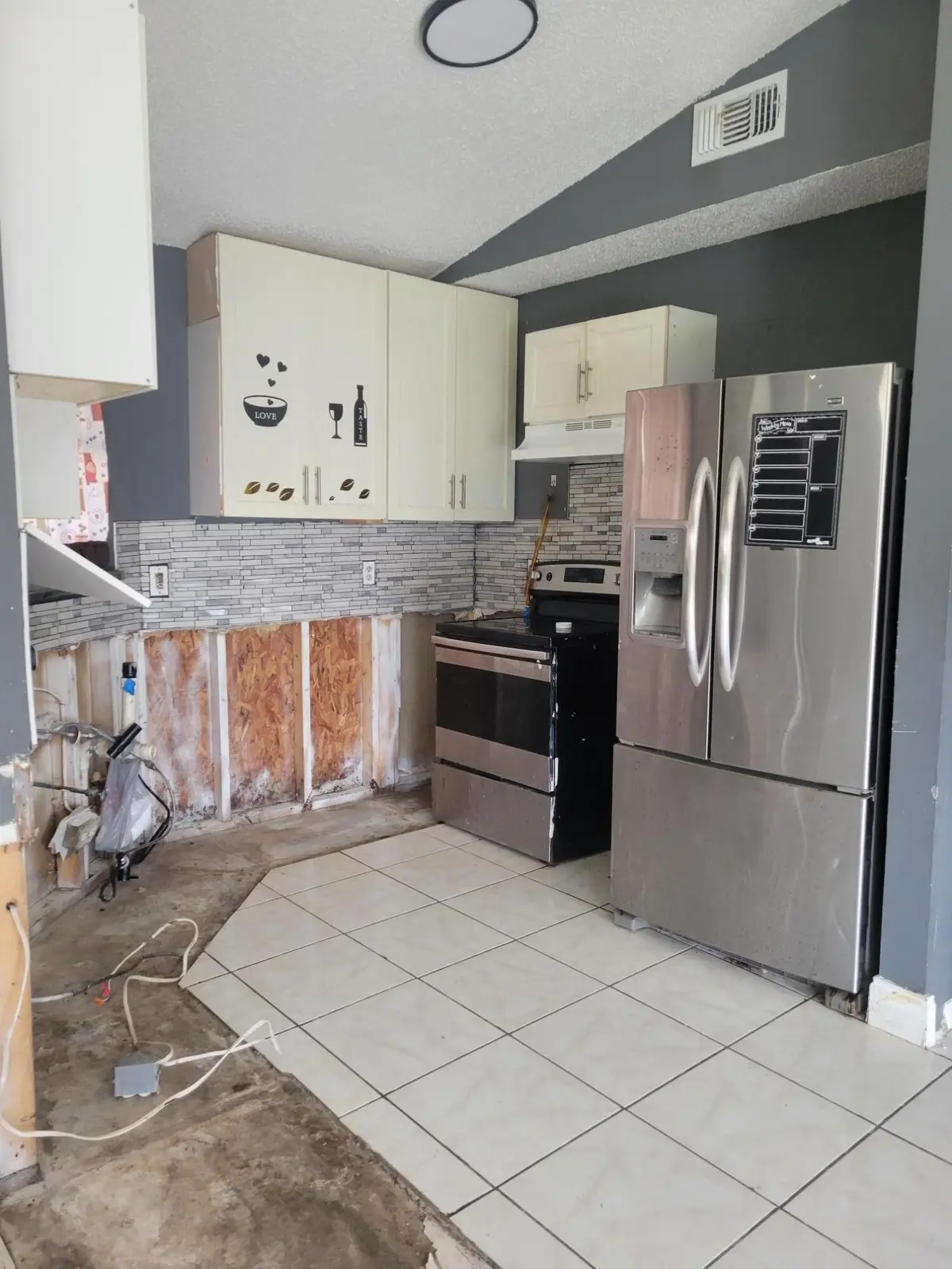 Kitchen gutted at 2837 STONEWAY Lane D, Fort Pierce