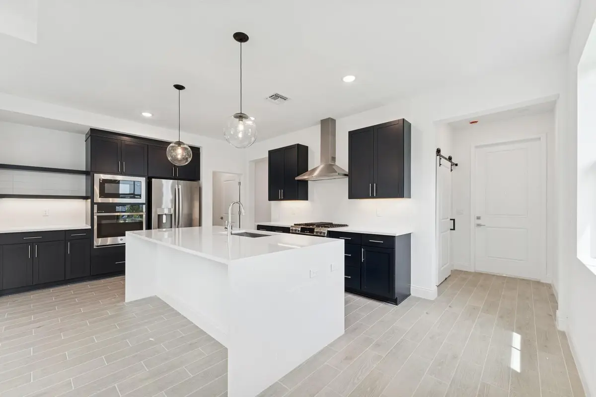 Kitchen and Foyer at 5942 Hammock Dl Way 58, Port St. Lucie