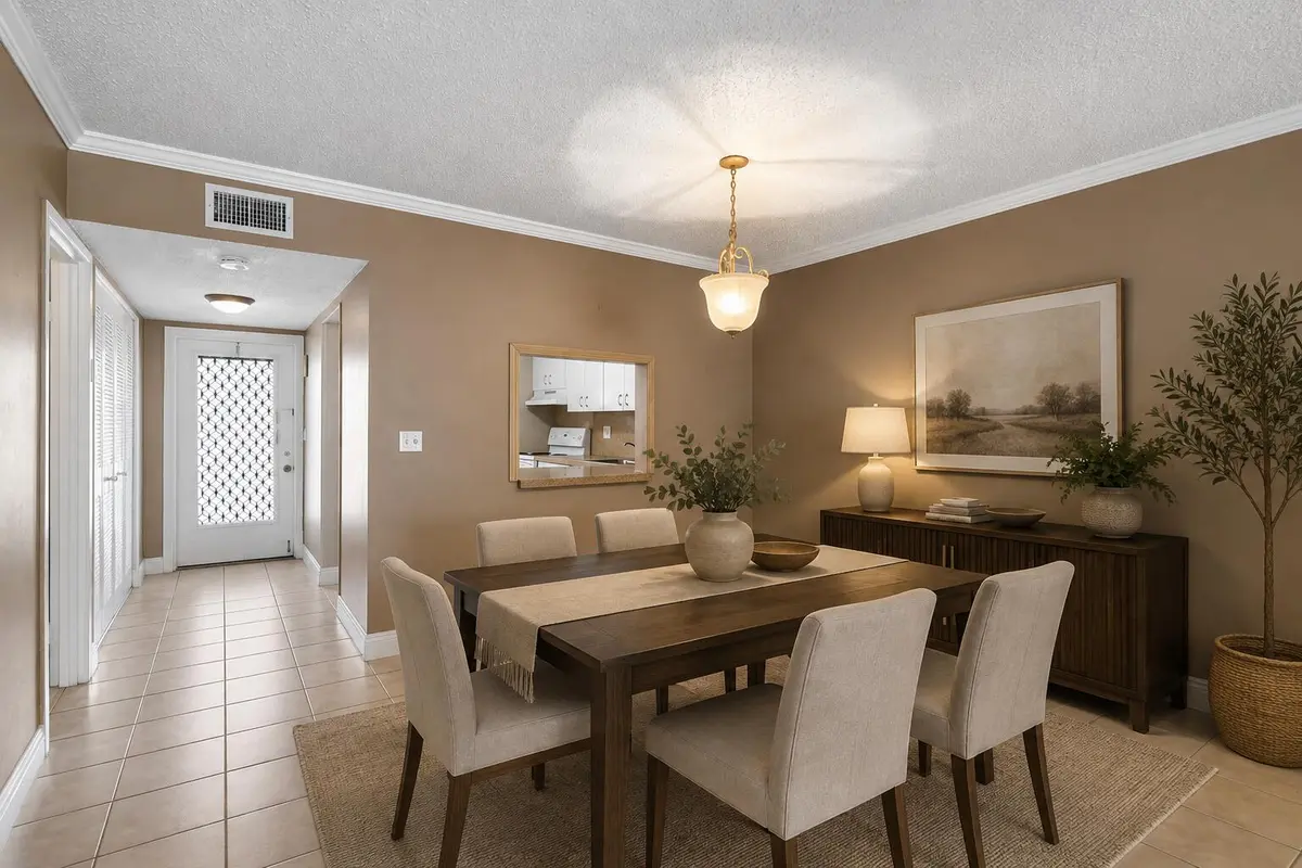 Staged Dining Room at 6 ABBEY Lane 206, Delray Beach