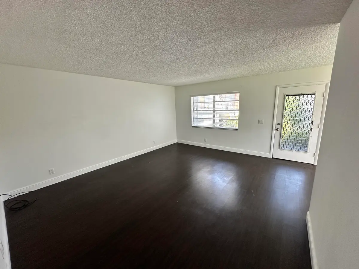 LIVINGROOM & FRONT DOOR at 248 PIEDMONT F, Delray Beach