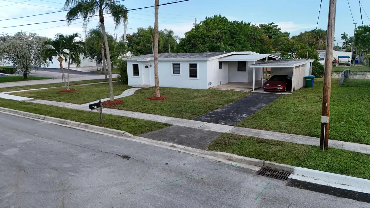 Pic from west side 5800 resized at 5800 NW 19TH Court, Margate