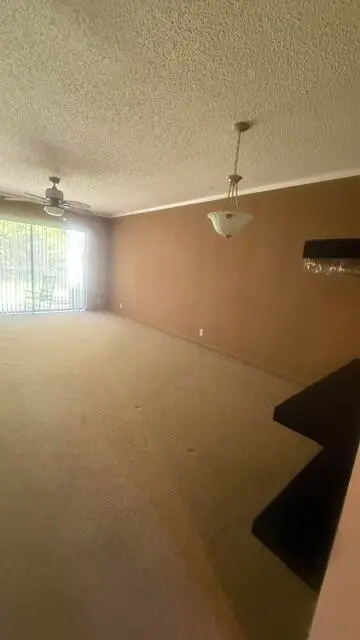 living room at 150 Lake Meryl Drive 145, West Palm Beach