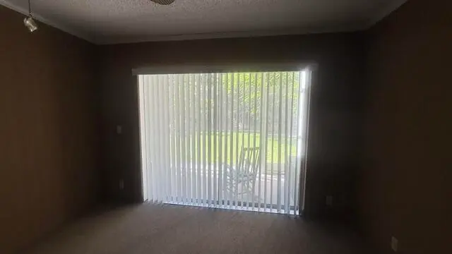 sliding doors to porch at 150 Lake Meryl Drive 145, West Palm Beach