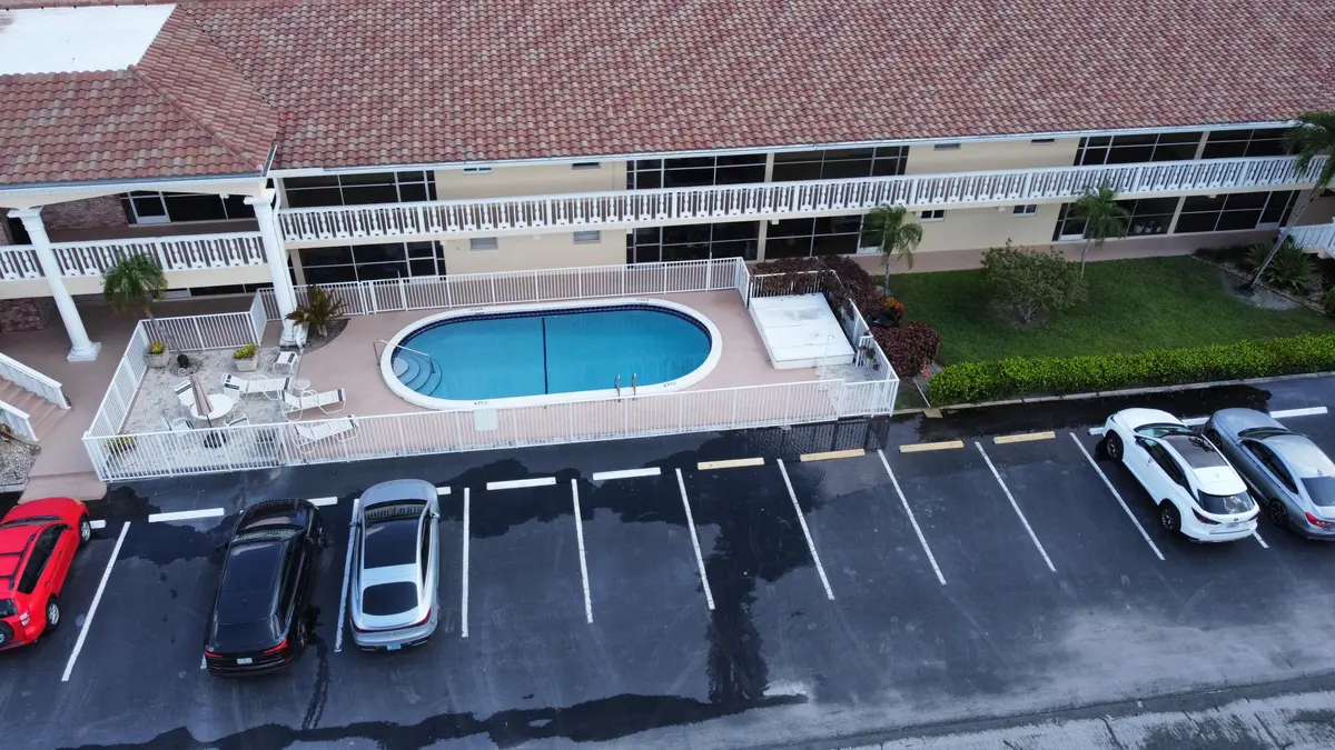 Aerial building and pool at 2121 NE 68TH Street 201, Fort Lauderdale