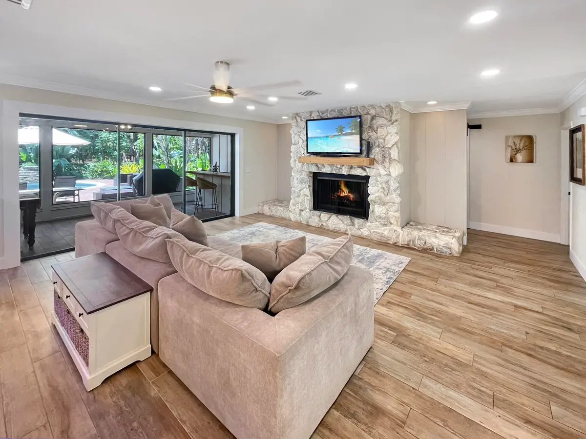 Family room & fireplace at 4500 SW Country Place, Palm City