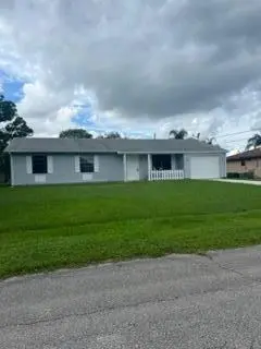 2556 SE HALLAHAN Street, Port St. Lucie – Single Family Residence for sale