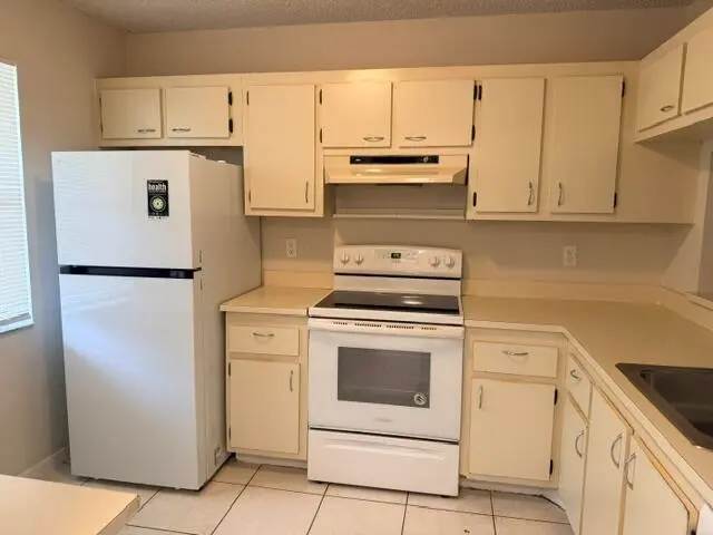 22064 - Kitchen at 22064 PALMS Way 102, Boca Raton
