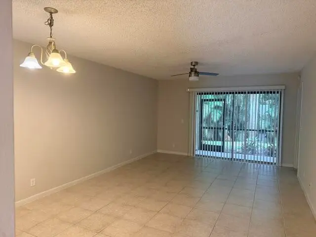Dining-Living Room at 22064 PALMS Way 102, Boca Raton