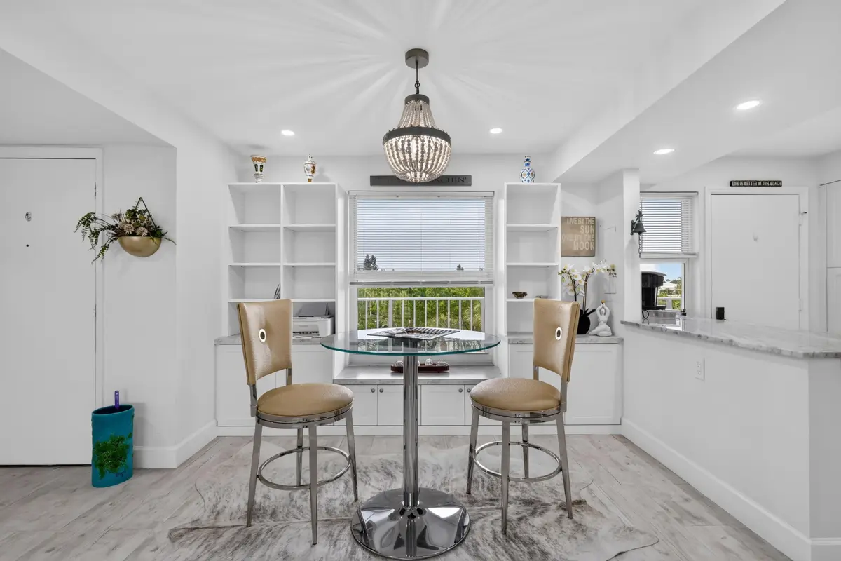 Dining area with built-in cabinetry at 1 Harbourside Drive 3403, Delray Beach