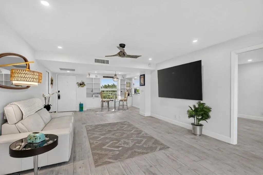 Living room with cord removed from TV at 1 Harbourside Drive 3403, Delray Beach