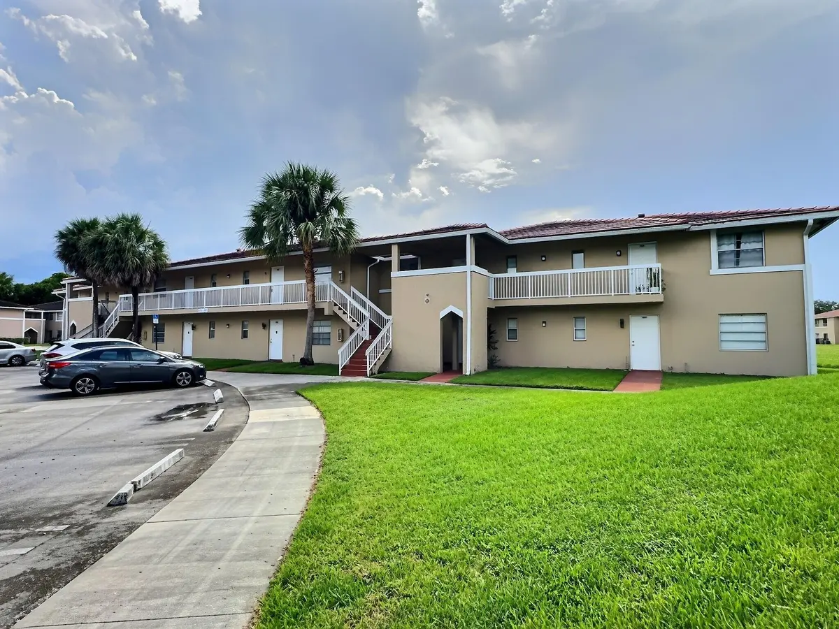 Front at 889 TWIN LAKES Drive 1-J, Coral Springs