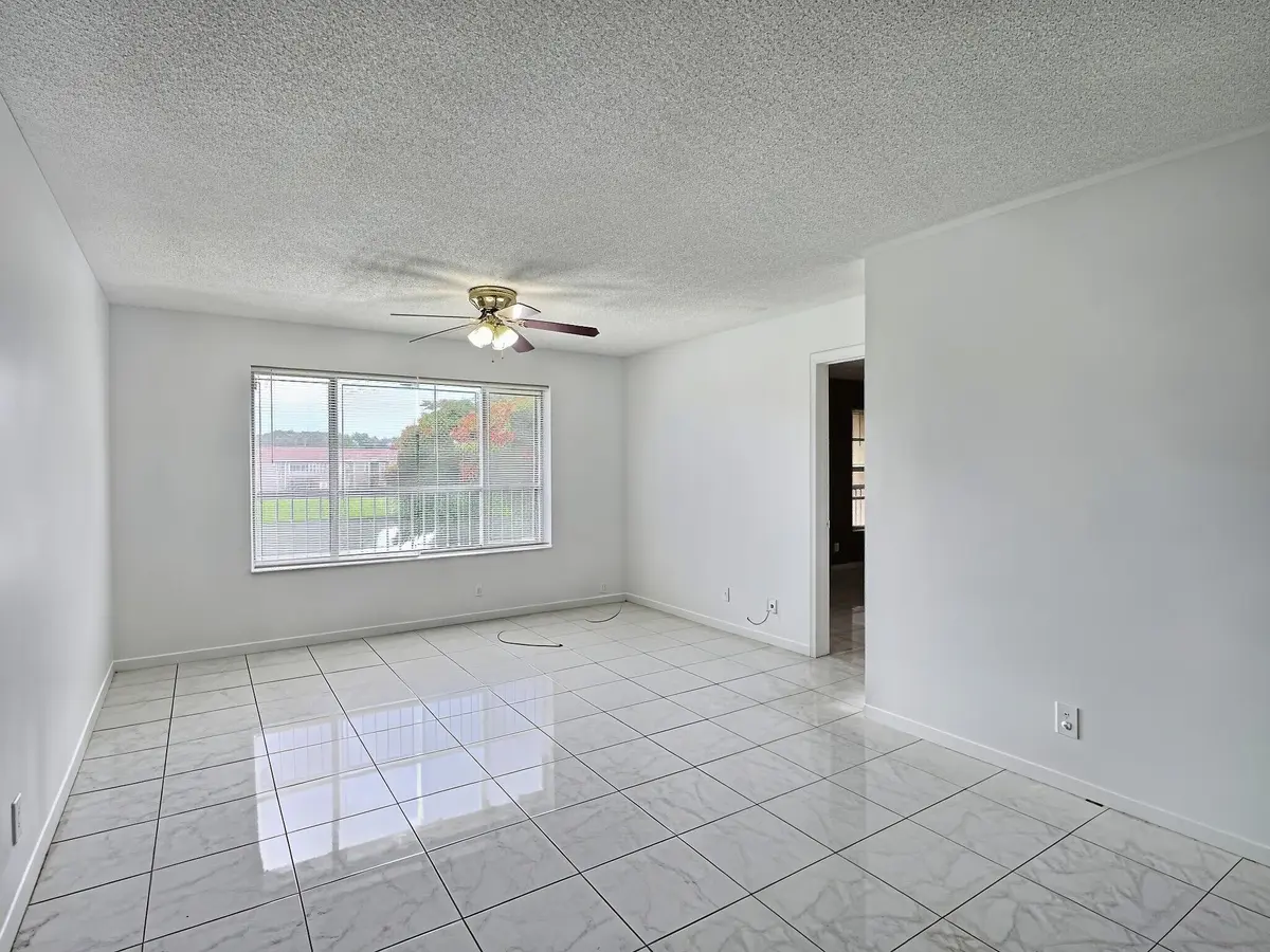 Living Room at 889 TWIN LAKES Drive 1-J, Coral Springs